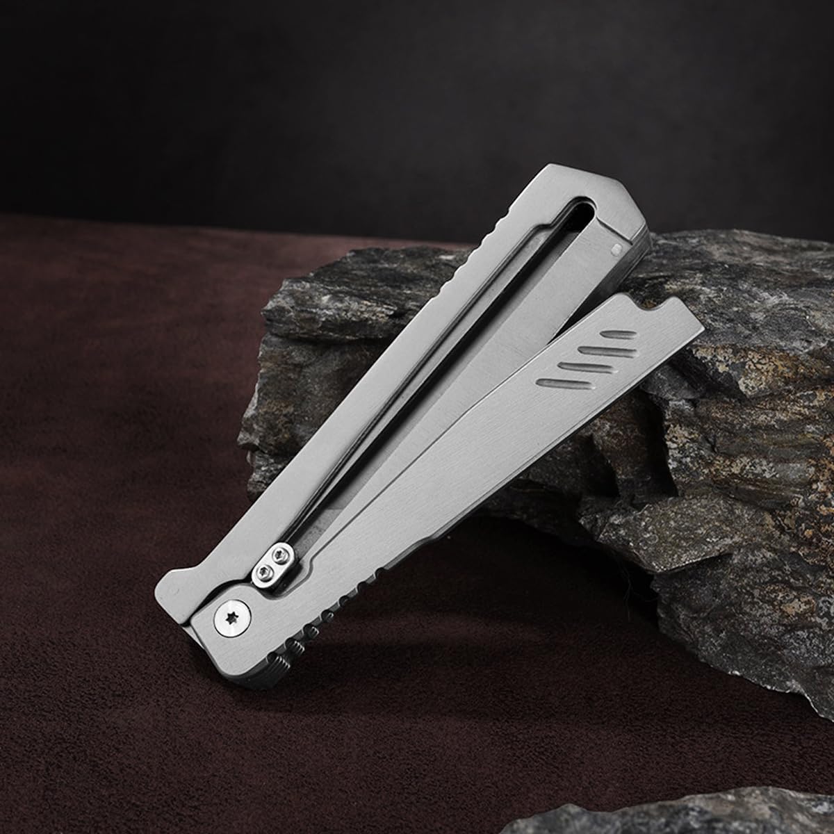 10MOONS belt clip keeps the folding knife secure during daily carry.