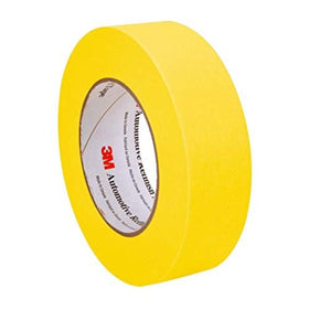 3M Automotive Refinish Masking Tape yellow on car hood for precise masking on curved surfaces.