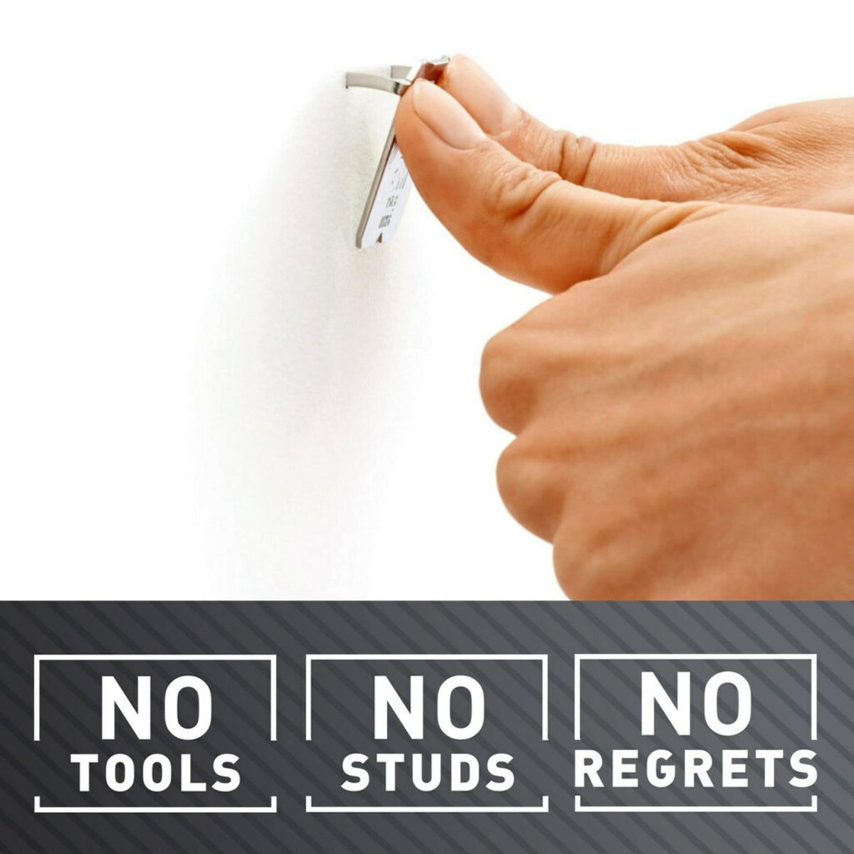 Close-up on 3M CLAW hardened steel claws gripping drywall