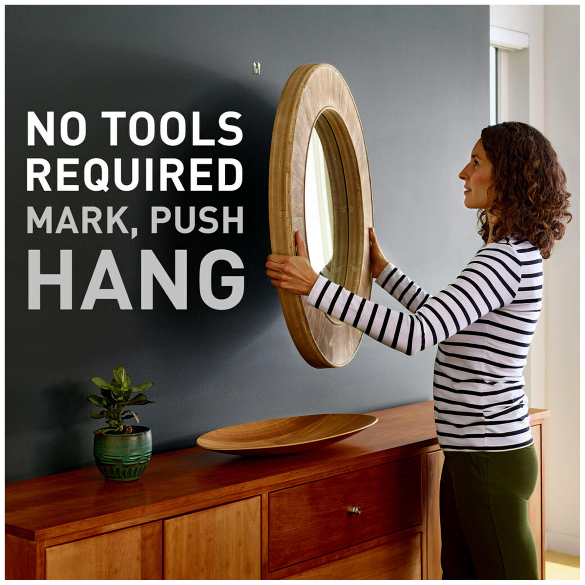 3M CLAW reusable hanger lets you redecorate without wall damage.