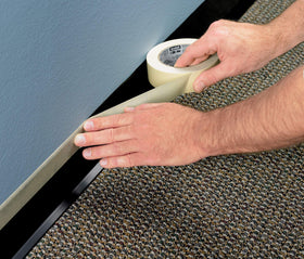 Close view of a 60-yard roll of 3M Highland masking tape for ample coverage.