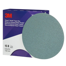 Close-up shows mineral patterning on 3M disc for consistent finishes