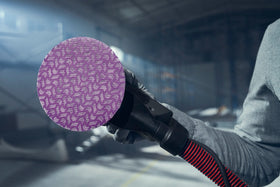 Net backing and hook-and-loop interface on 3M Xtract 710W enables quick disc changes.