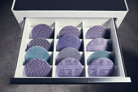 Pack of 50 discs ready for metal, wood, and composites finishing tasks.