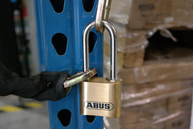 ABUS 180/50 brass padlock highlighting the combination dial for controlled access.