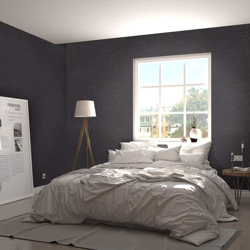 Abyssaly wallpaper on cabinets to create coordinated liners