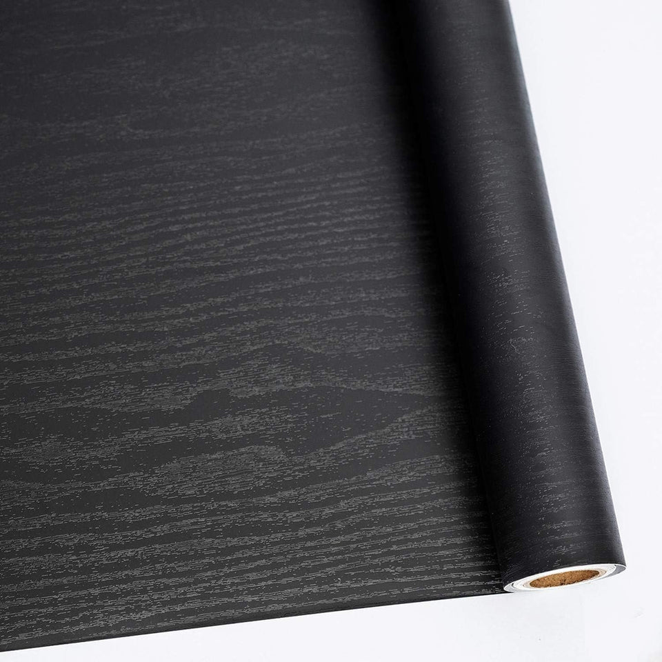 Abyssaly Black Wood peel-and-stick roll showing rich grain for quick furniture updates