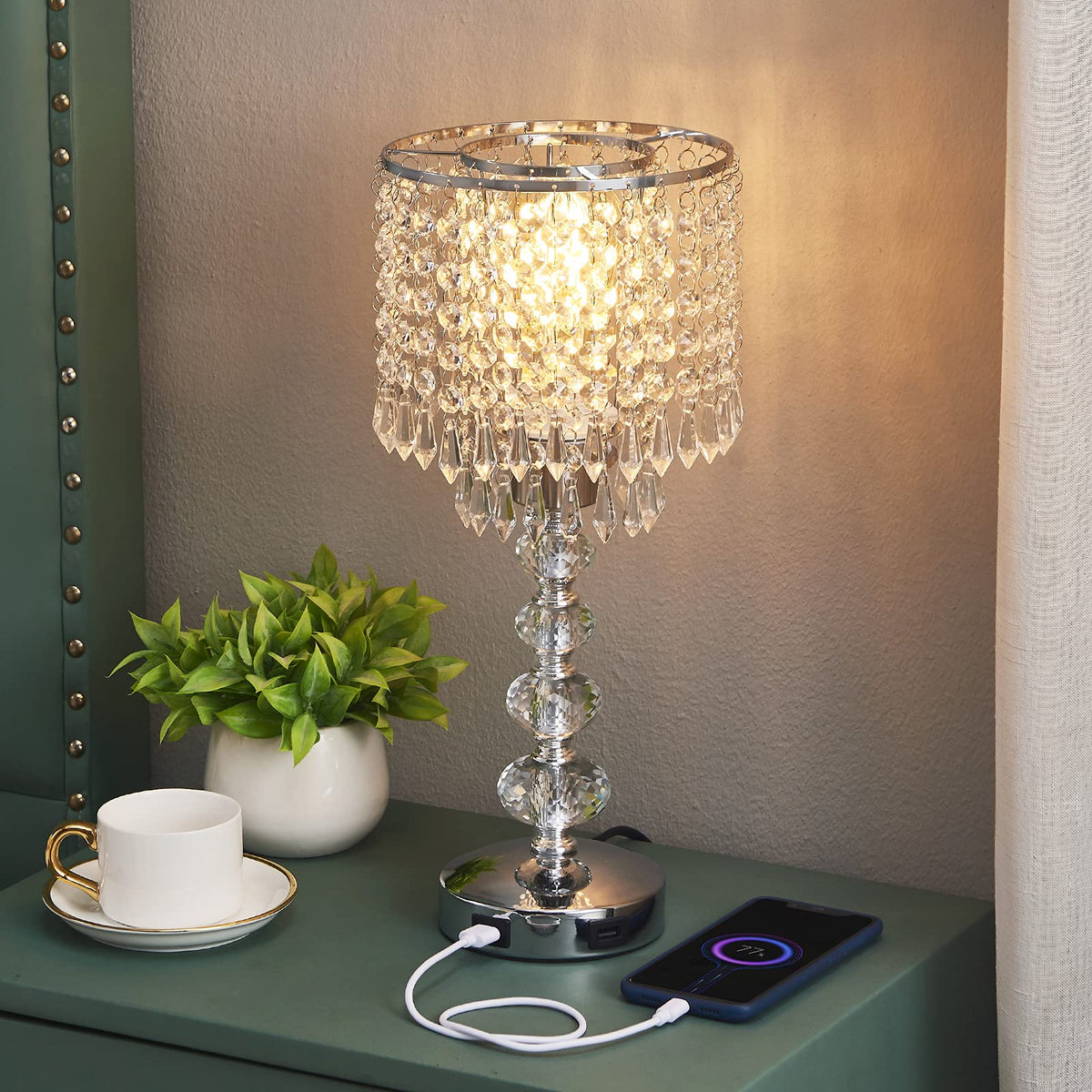 Acaxin teardrop crystal gleams, enhancing room elegance.