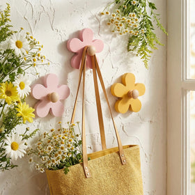 AceOrbit Daisy wall hook purple front view, cute decor with practical hanging.