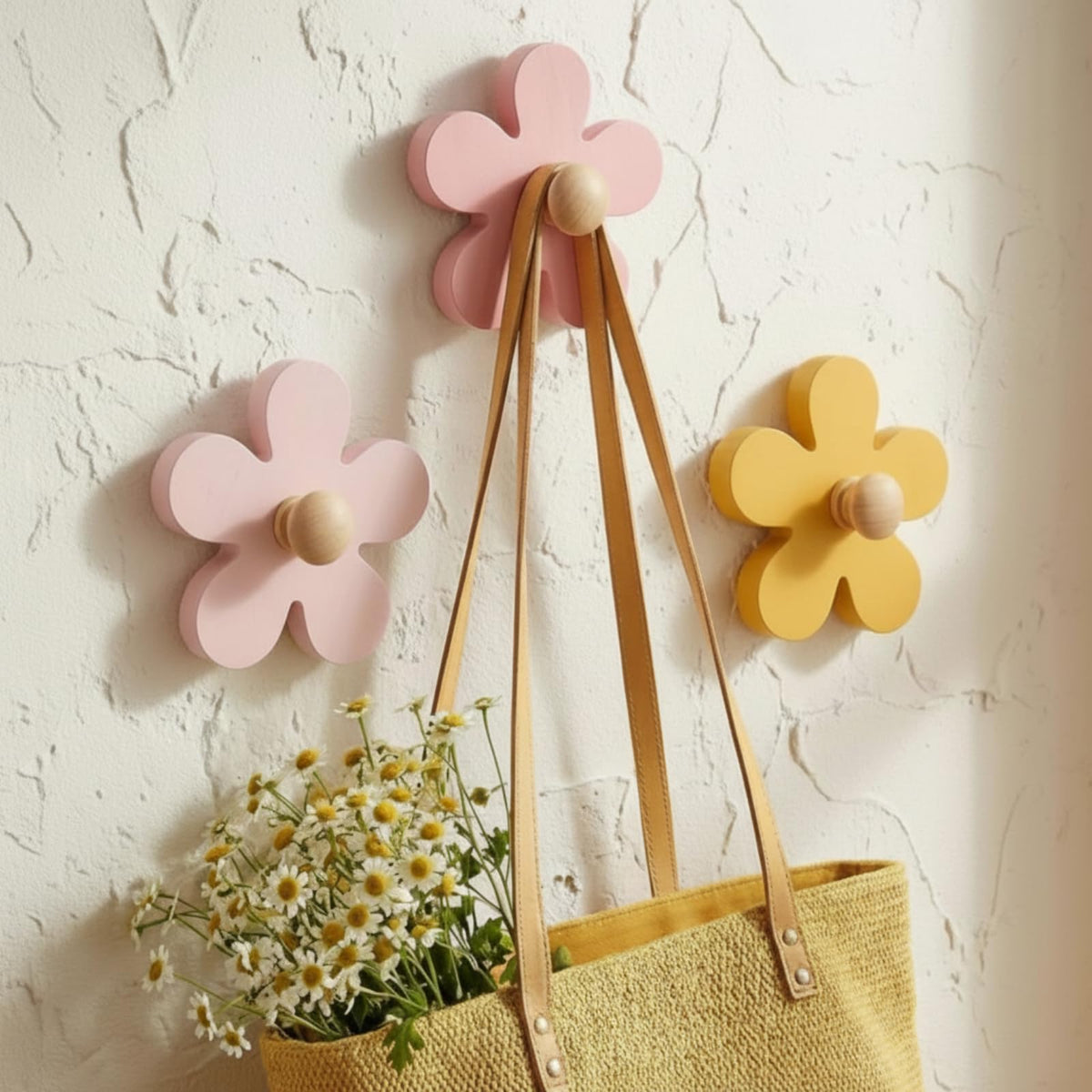 AceOrbit Daisy wall hook yellow front view, decorative and sturdy for towels and bags.