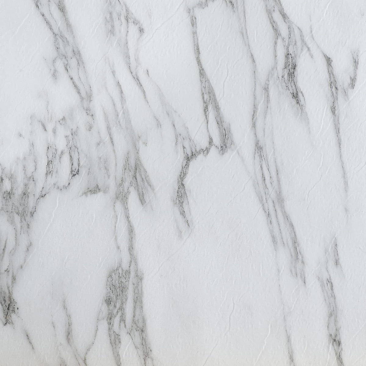 Nexus Bianco Marble tile close-up showing peel-and-stick installation ease.