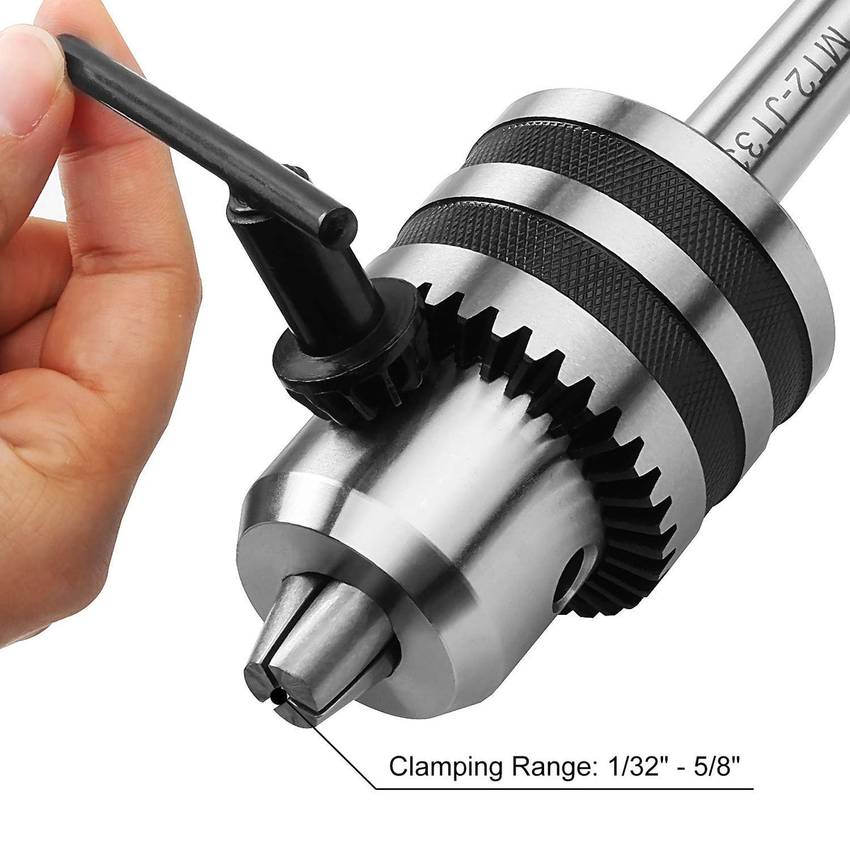 Acrux7 chuck mounted on a lathe or drill press for versatility.