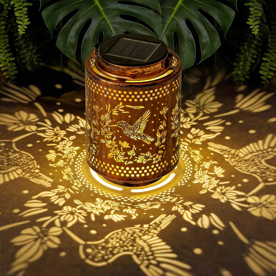 Adebime hummingbird lantern hanging casts graceful silhouettes, creating inviting outdoor ambiance.