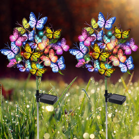 Adecorty solar butterfly garden lights 2-pack illuminate paths with colorful butterflies.