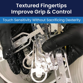 Gloves in dispenser box for quick access in a busy workspace.