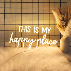 Adnkwolivt This Is My Happy Place neon sign on the wall creates warm, inviting room ambiance.