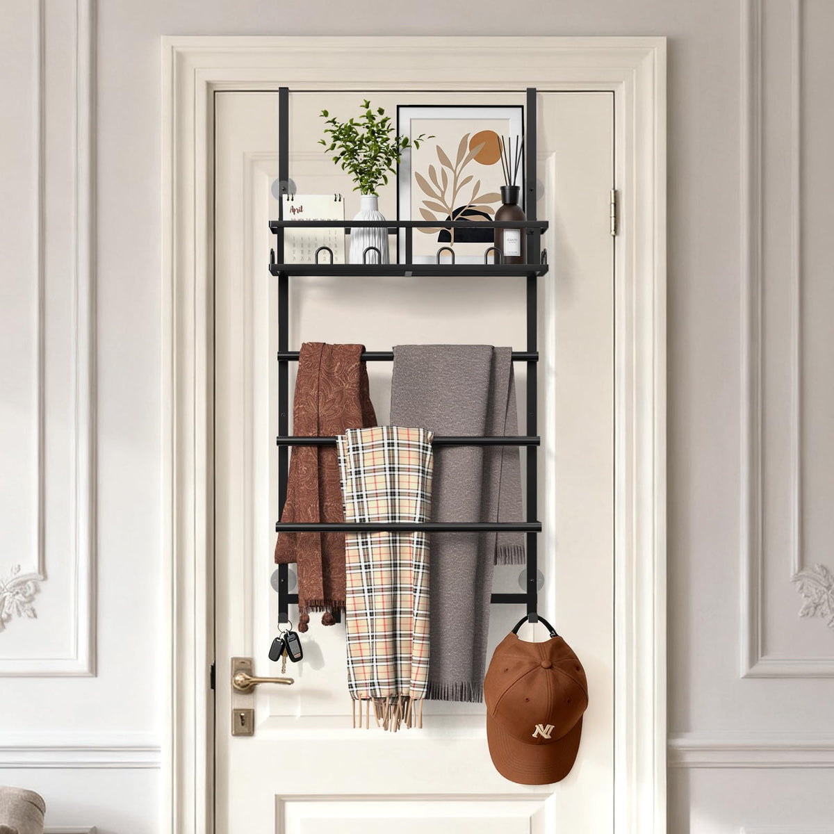 Aetyord towel rack top shelf holds tissues and bath products in black.