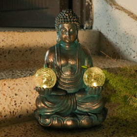 Afirst solar Buddha sculpture suits indoor corners and outdoor patios