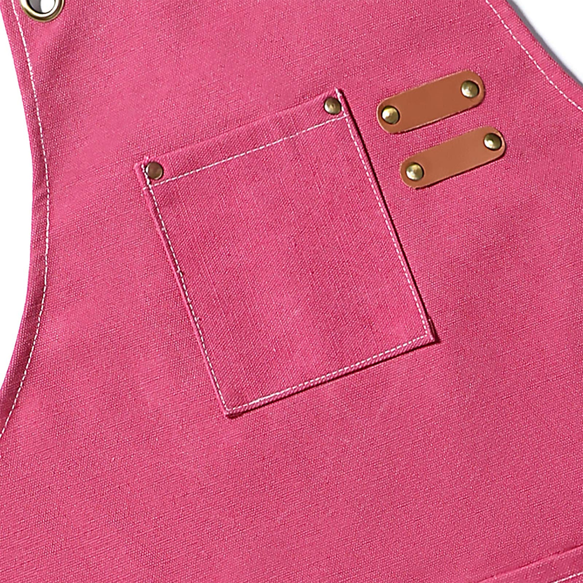AFUN pink apron showing reinforced rivet-edged pockets for longevity
