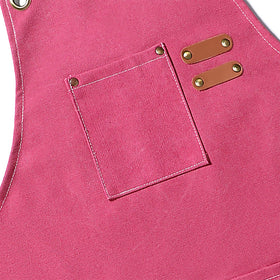 AFUN pink apron showing reinforced rivet-edged pockets for longevity