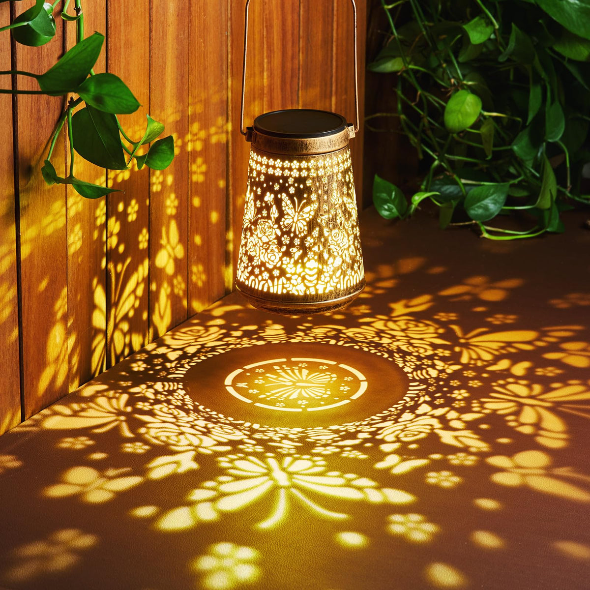Waterproof metal solar lanterns from Ahaorigin withstand outdoor weather on a patio.