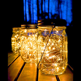 Aikeve jars with solar panel lids powered by sun for easy setup.