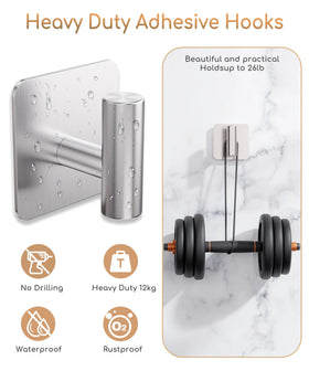 Aikzik hooks mounted on door and wall for coats and bags.