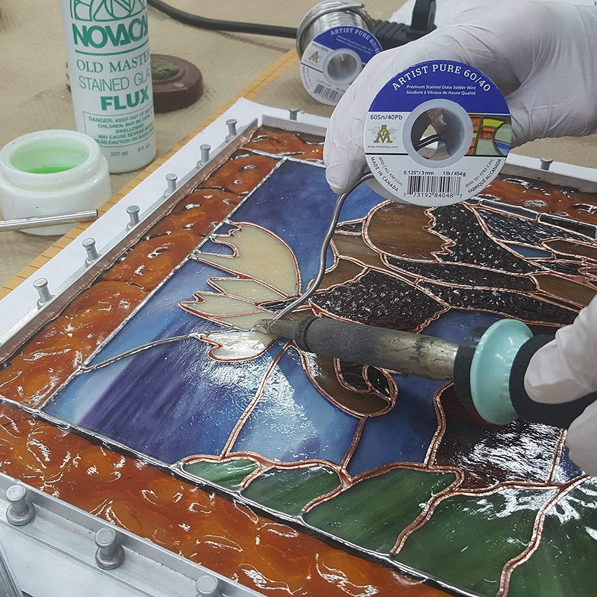 AIM Artist Pure 60/40 solder in action delivers steady flow.