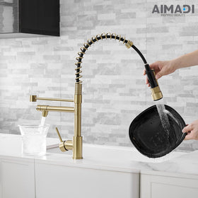 AIMADI brushed gold faucet with 360-degree swivel over sink