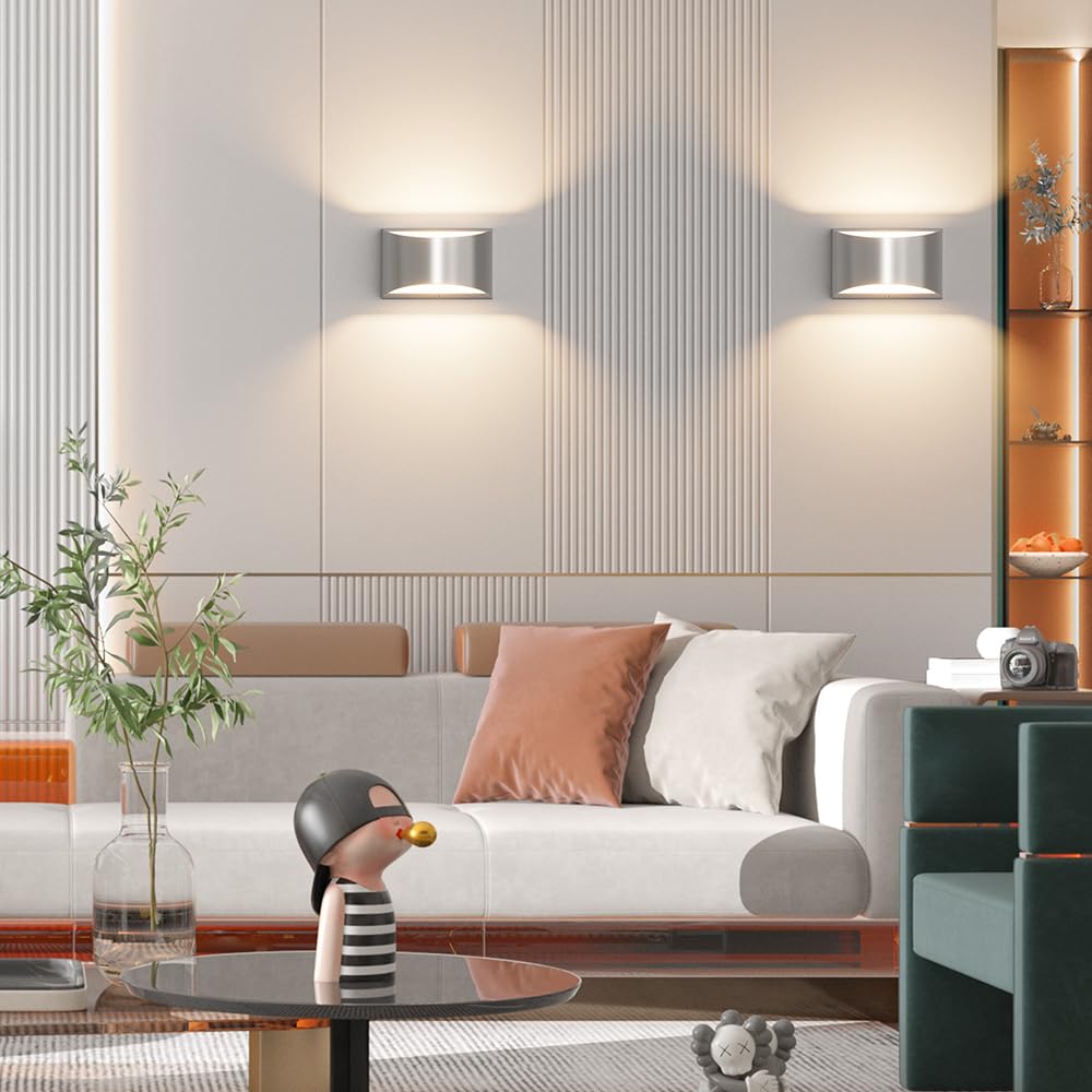 Aipsun nickel modern LED wall sconce in a bedroom creating cozy 3000K ambience