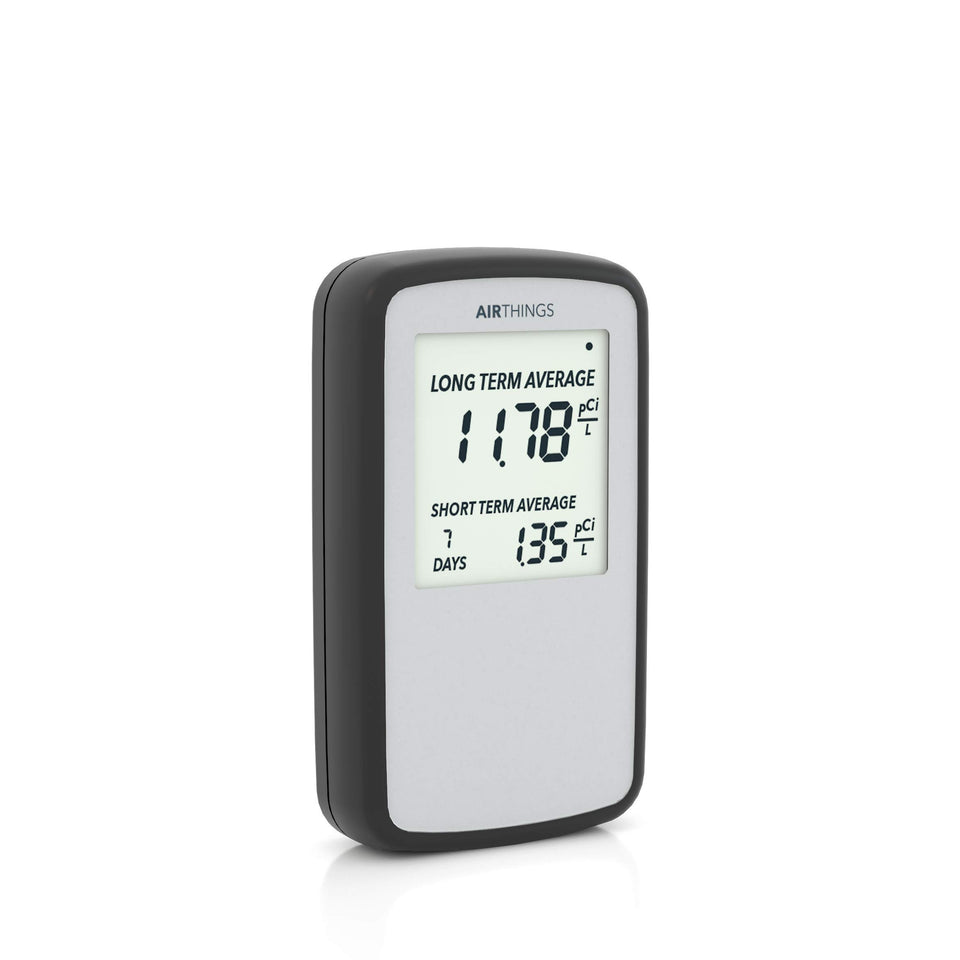 Airthings Corentium Home front view showing a compact portable radon detector.