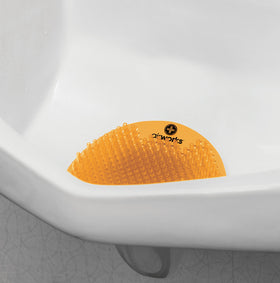 AirWorks Splash Free Urinal Screen shows debris barrier and drainage protection in action