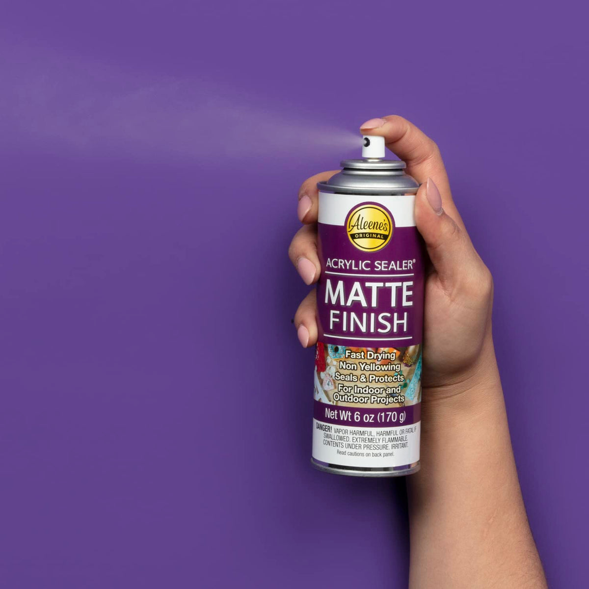 Aleene's Matte spray coating on glass shows quick-dry clarity