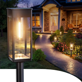 ALFIOT solar pathway light front view with warm glow along the walkway, enhancing safety