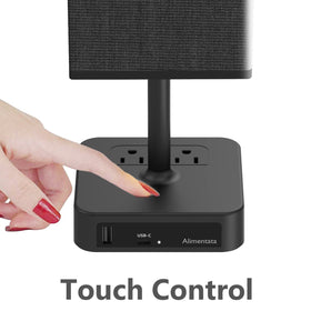 Alimentata bedside lamp USB-C port powering devices for night use.