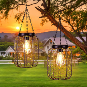All Fortune hanging solar lantern with copper wire casts elegant glow on patios and pathways