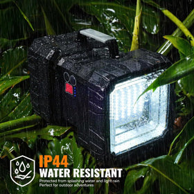 AlpsWolf IP44 waterproof flashlight handling splashes during outdoor activities