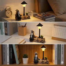 Amallino No Face Lamp desk light creates warm ambiance for study