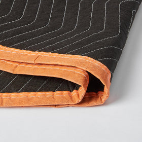 Amazon Basics blanket helps slide a heavy item across floors smoothly.