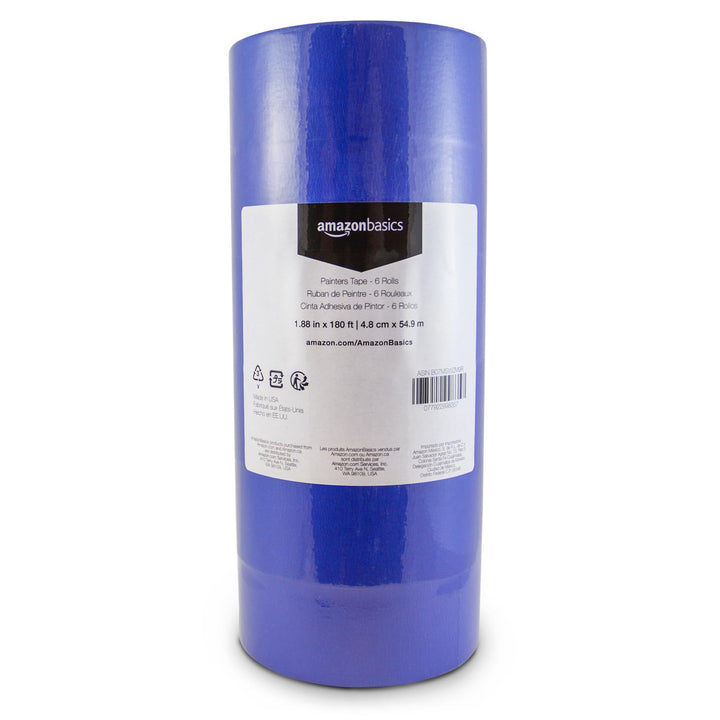 Amazon Basics blue painter's tape on wall creates crisp masking edge for clean lines