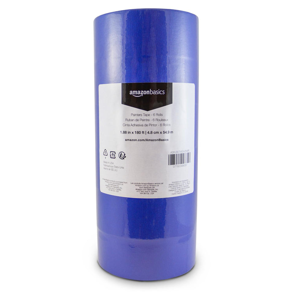 Amazon Basics blue painter's tape on wall creates crisp masking edge for clean lines