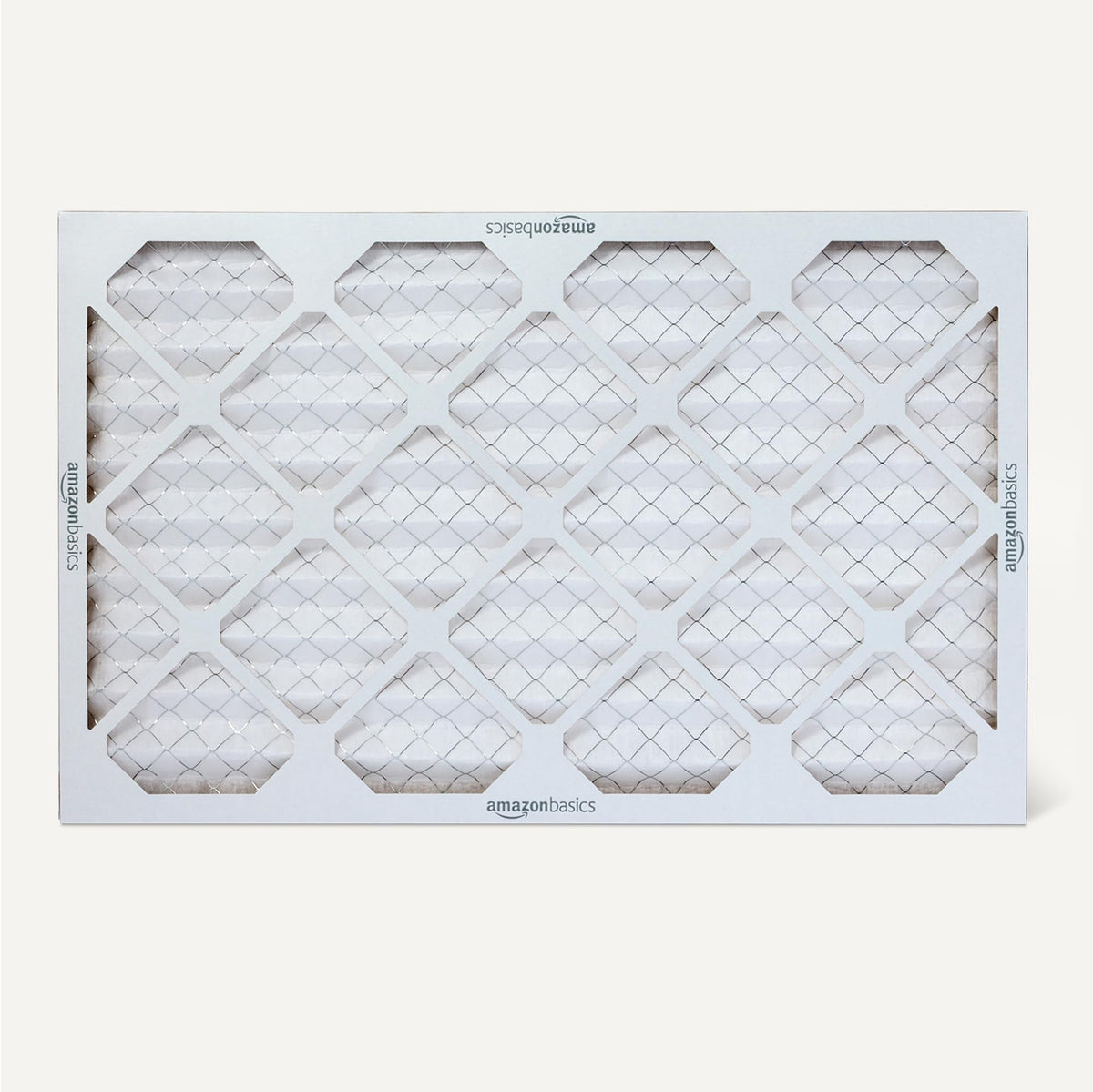 Close-up of Amazon Basics MERV 5 filter highlighting electrostatic filtration.