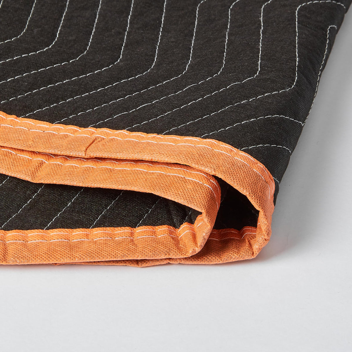 Amazon Basics blanket used to fill empty space in a box for safer packing