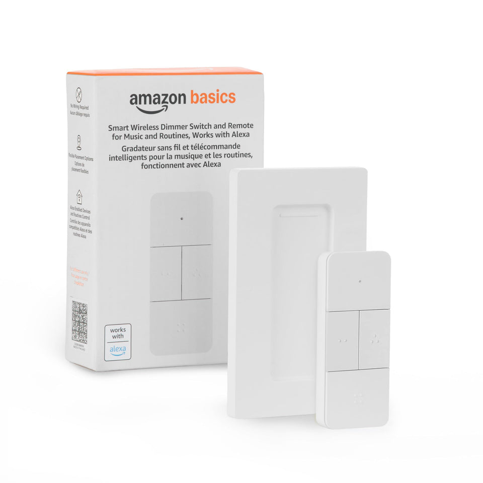 Amazon Basics smart dimmer remote in hand for convenient lighting control anywhere.
