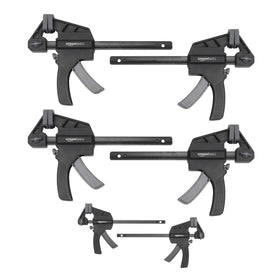 Amazon Basics trigger clamp 4-inch two-pack shows secure grip and quick release.