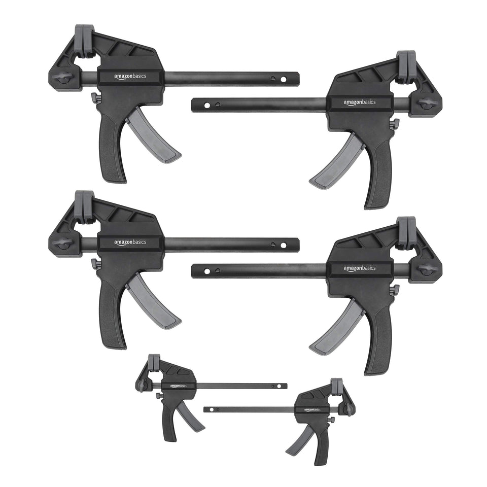 Amazon Basics trigger clamp 4-inch two-pack shows secure grip and quick release.