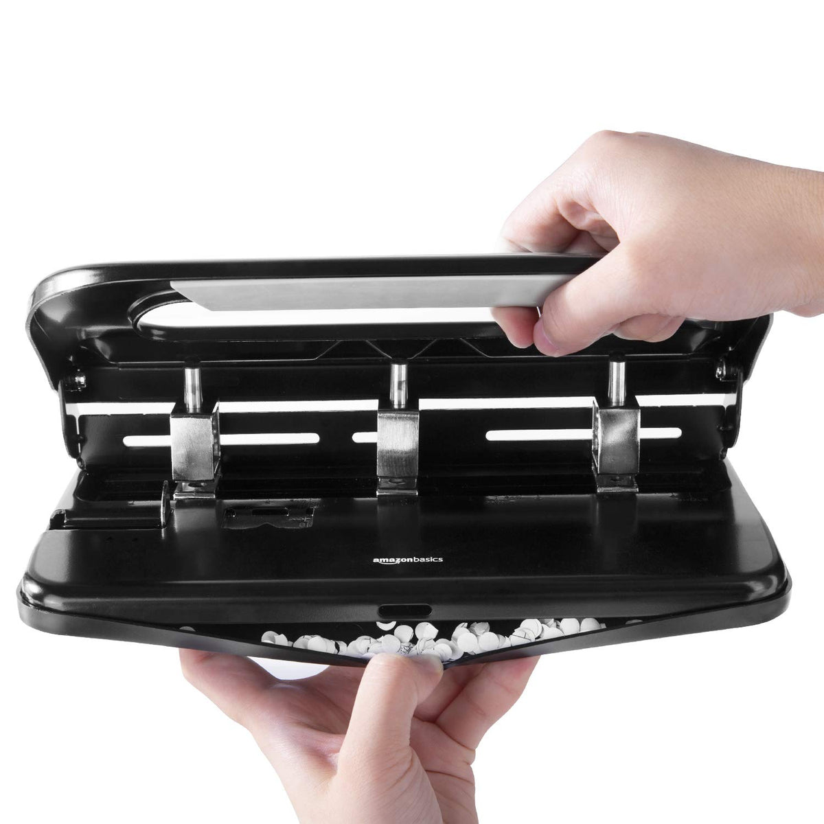 Easy-access tray catching paper remnants during operation