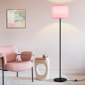 Ambimall 60-inch floor lamp with pink shade and black pole enhances living room ambiance.