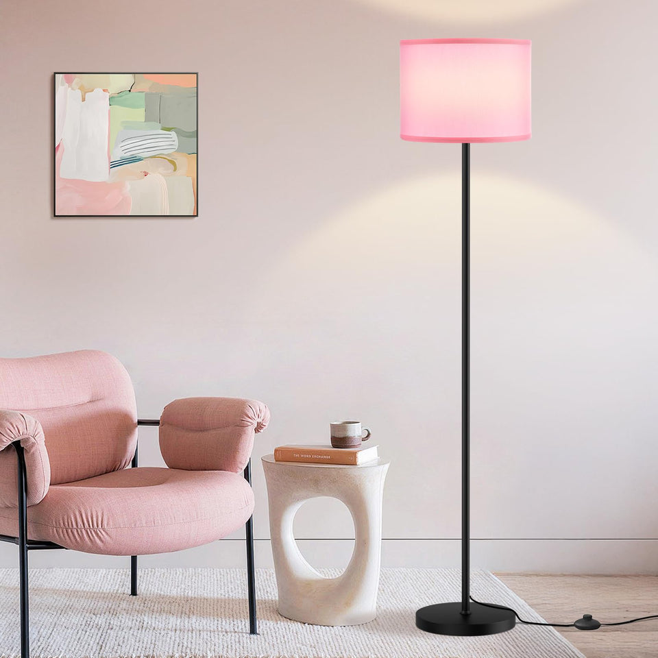 Ambimall 60-inch floor lamp with pink shade and black pole enhances living room ambiance.
