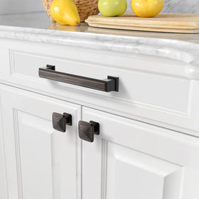 Amerdeco 10-pack bronze cabinet pulls enhancing kitchen or dresser.